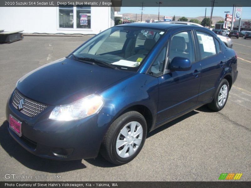 Deep Sea Blue Metallic / Beige 2010 Suzuki SX4 Sedan LE