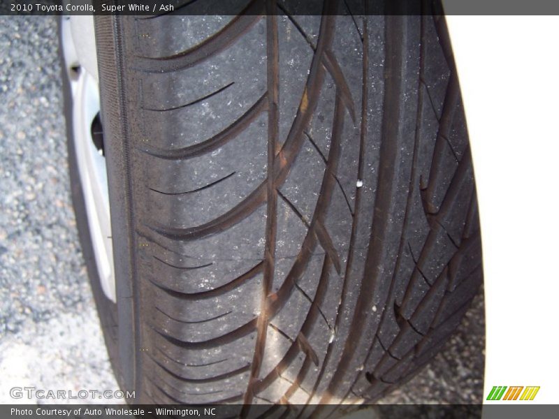 Super White / Ash 2010 Toyota Corolla