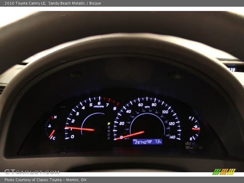 Sandy Beach Metallic / Bisque 2010 Toyota Camry LE