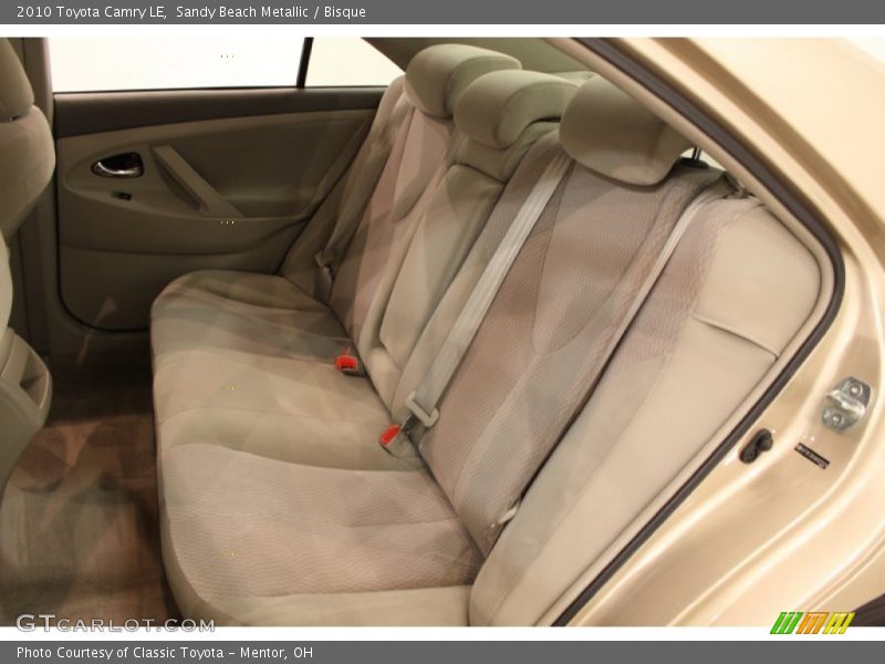 Sandy Beach Metallic / Bisque 2010 Toyota Camry LE