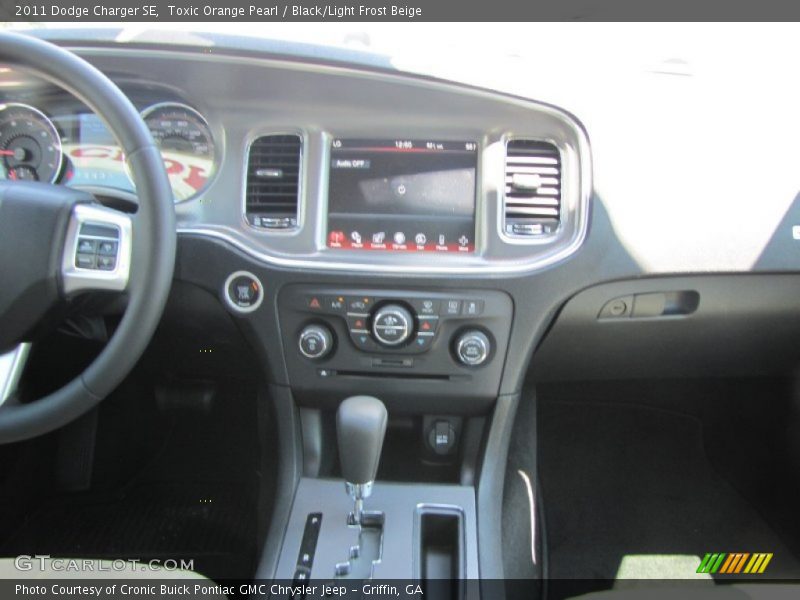 Toxic Orange Pearl / Black/Light Frost Beige 2011 Dodge Charger SE