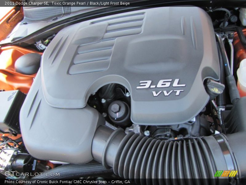 Toxic Orange Pearl / Black/Light Frost Beige 2011 Dodge Charger SE