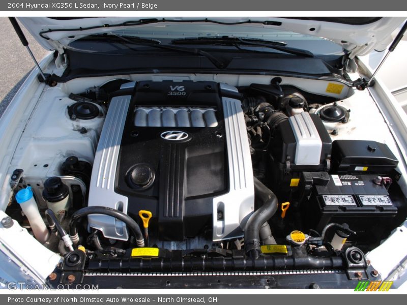 Ivory Pearl / Beige 2004 Hyundai XG350 L Sedan