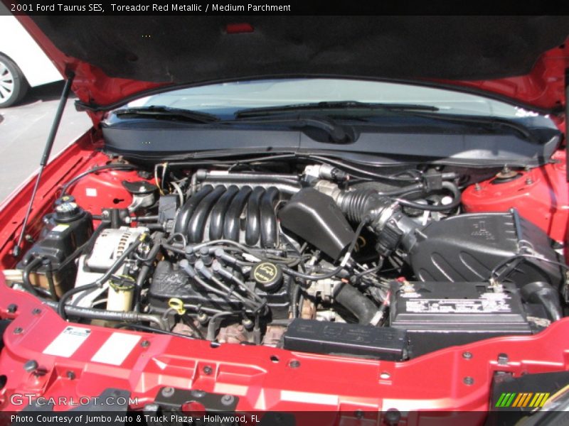 Toreador Red Metallic / Medium Parchment 2001 Ford Taurus SES