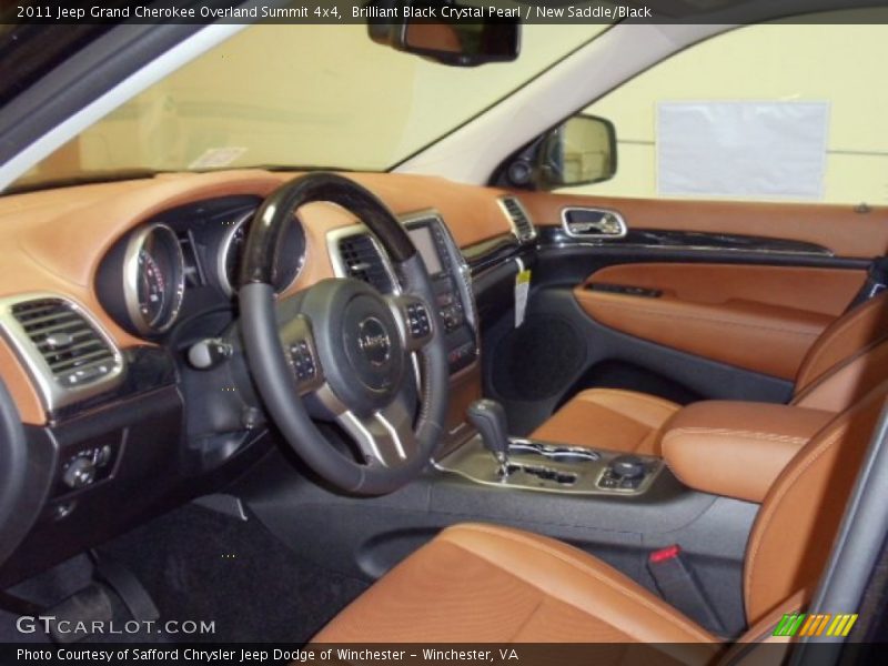 Brilliant Black Crystal Pearl / New Saddle/Black 2011 Jeep Grand Cherokee Overland Summit 4x4