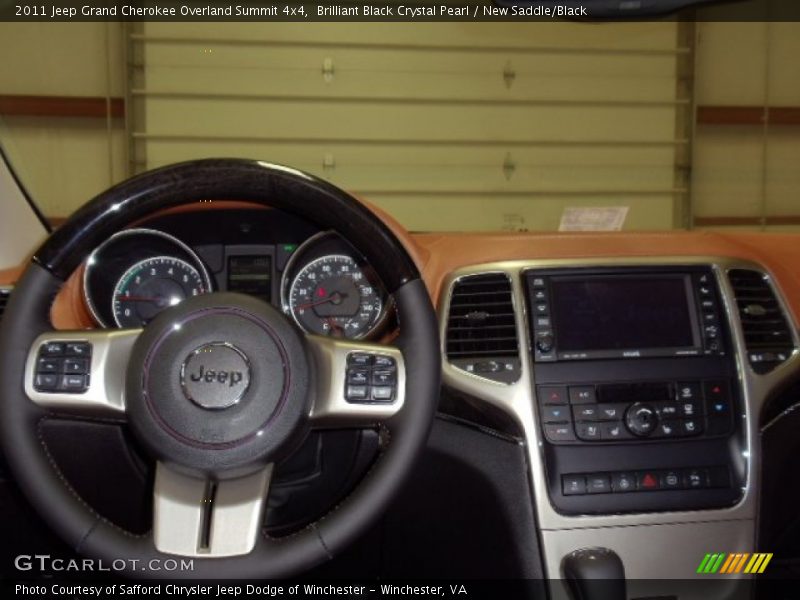 Brilliant Black Crystal Pearl / New Saddle/Black 2011 Jeep Grand Cherokee Overland Summit 4x4