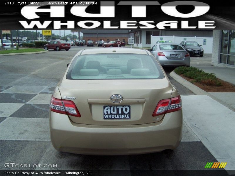 Sandy Beach Metallic / Bisque 2010 Toyota Camry LE