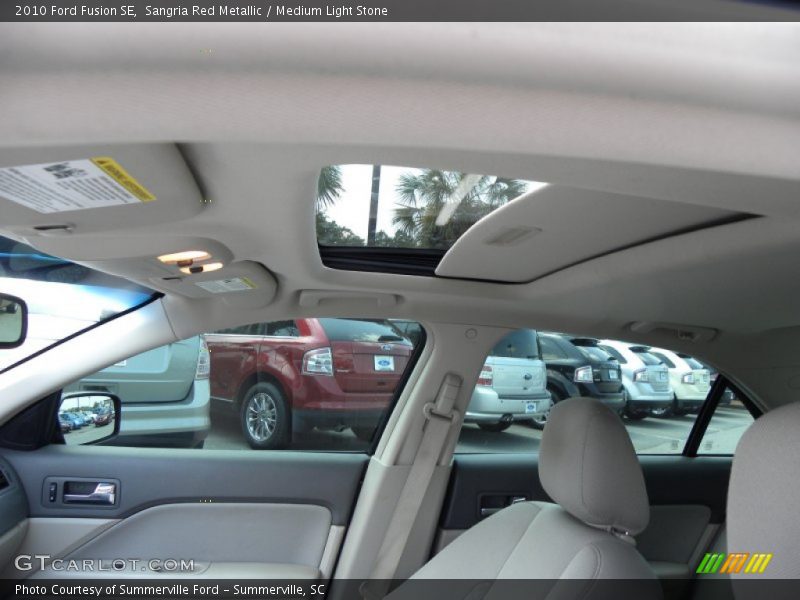 Sangria Red Metallic / Medium Light Stone 2010 Ford Fusion SE