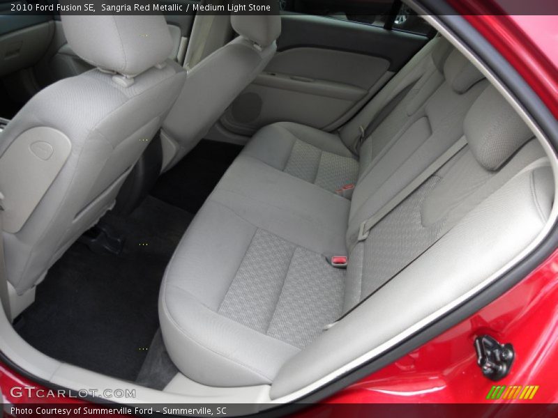 Sangria Red Metallic / Medium Light Stone 2010 Ford Fusion SE