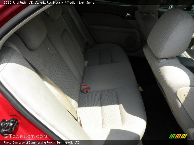 Sangria Red Metallic / Medium Light Stone 2010 Ford Fusion SE