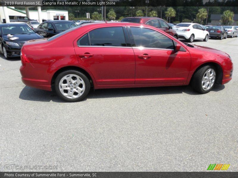 Sangria Red Metallic / Medium Light Stone 2010 Ford Fusion SE