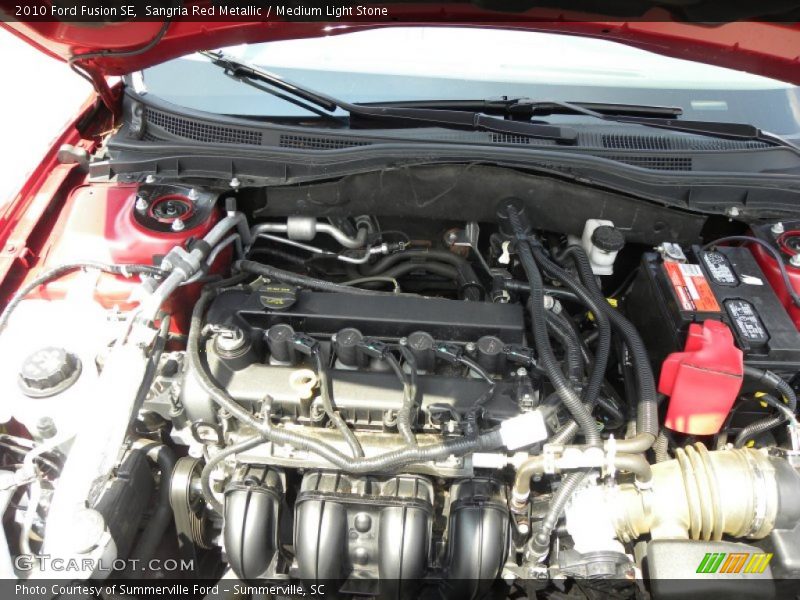 Sangria Red Metallic / Medium Light Stone 2010 Ford Fusion SE