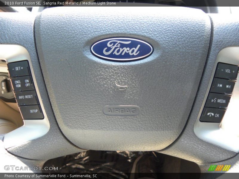 Sangria Red Metallic / Medium Light Stone 2010 Ford Fusion SE
