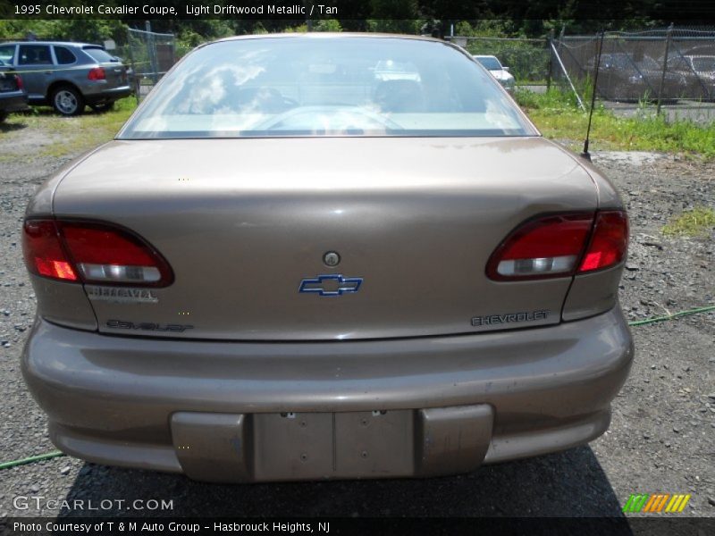 Light Driftwood Metallic / Tan 1995 Chevrolet Cavalier Coupe