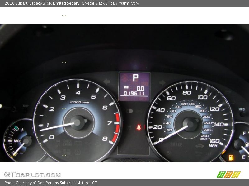 Crystal Black Silica / Warm Ivory 2010 Subaru Legacy 3.6R Limited Sedan