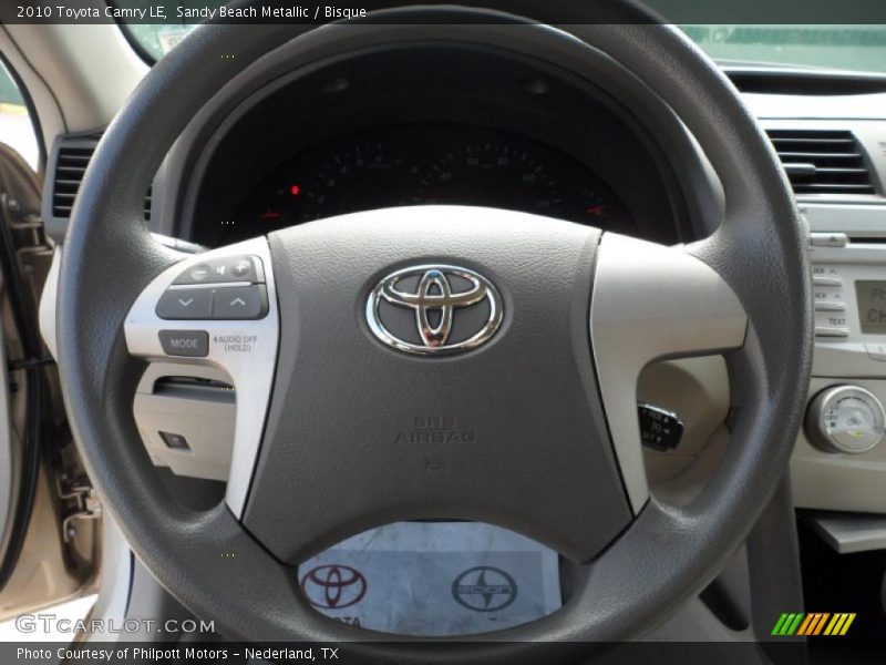 Sandy Beach Metallic / Bisque 2010 Toyota Camry LE