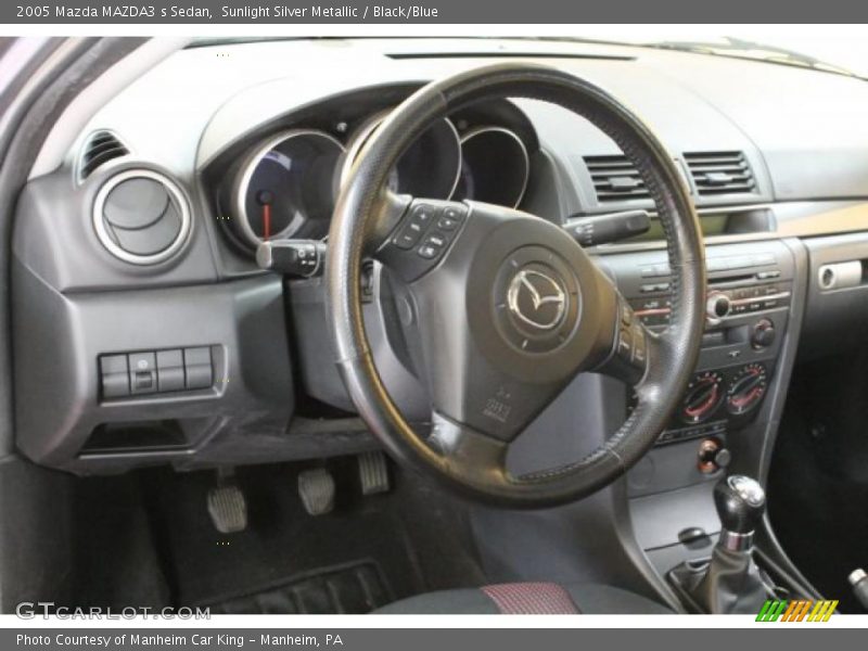 Sunlight Silver Metallic / Black/Blue 2005 Mazda MAZDA3 s Sedan
