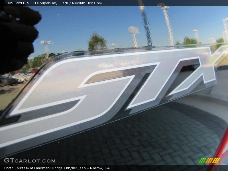 Black / Medium Flint Grey 2005 Ford F150 STX SuperCab