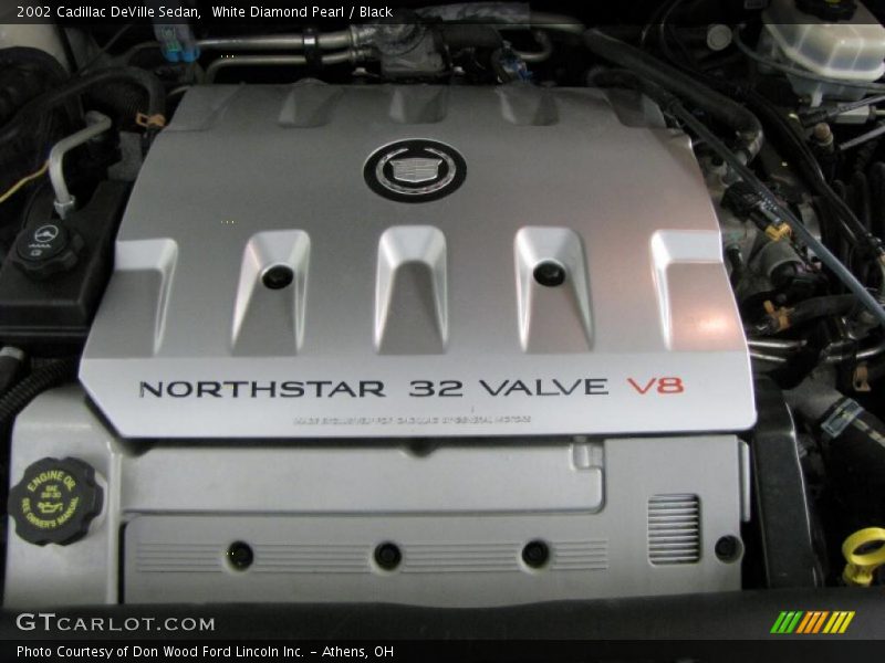White Diamond Pearl / Black 2002 Cadillac DeVille Sedan