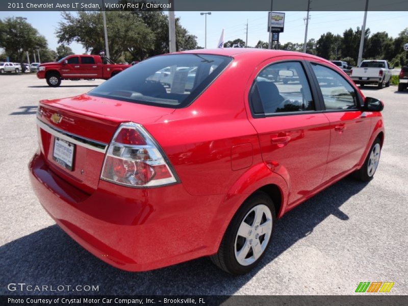 Victory Red / Charcoal 2011 Chevrolet Aveo LT Sedan