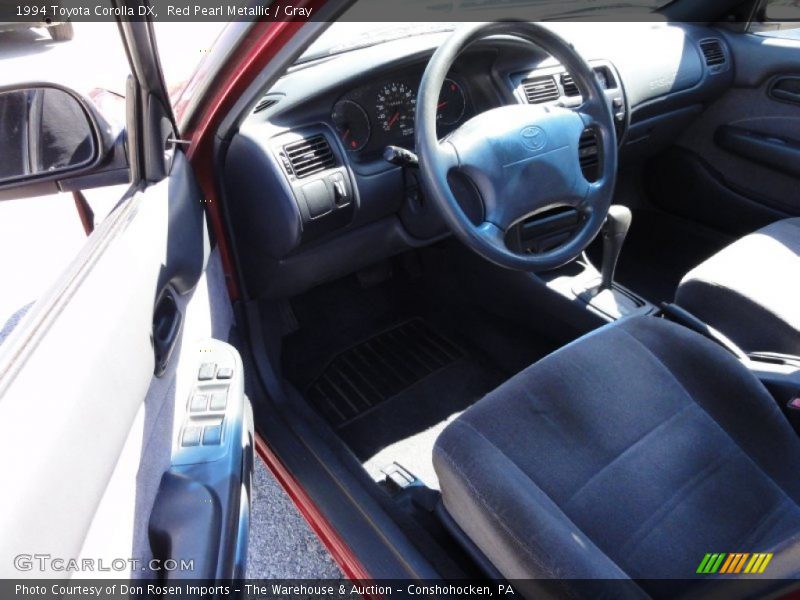 Red Pearl Metallic / Gray 1994 Toyota Corolla DX