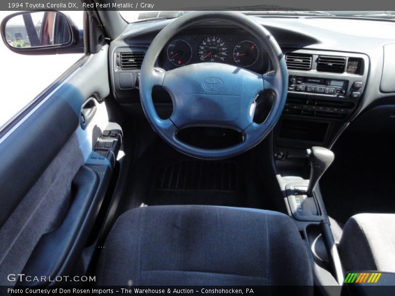 Red Pearl Metallic / Gray 1994 Toyota Corolla DX