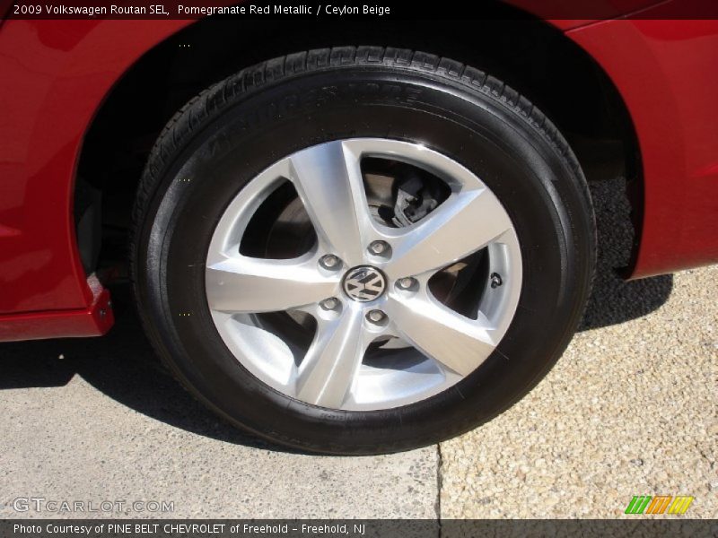 Pomegranate Red Metallic / Ceylon Beige 2009 Volkswagen Routan SEL