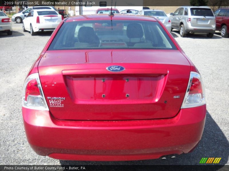 Redfire Metallic / Charcoal Black 2009 Ford Fusion SE