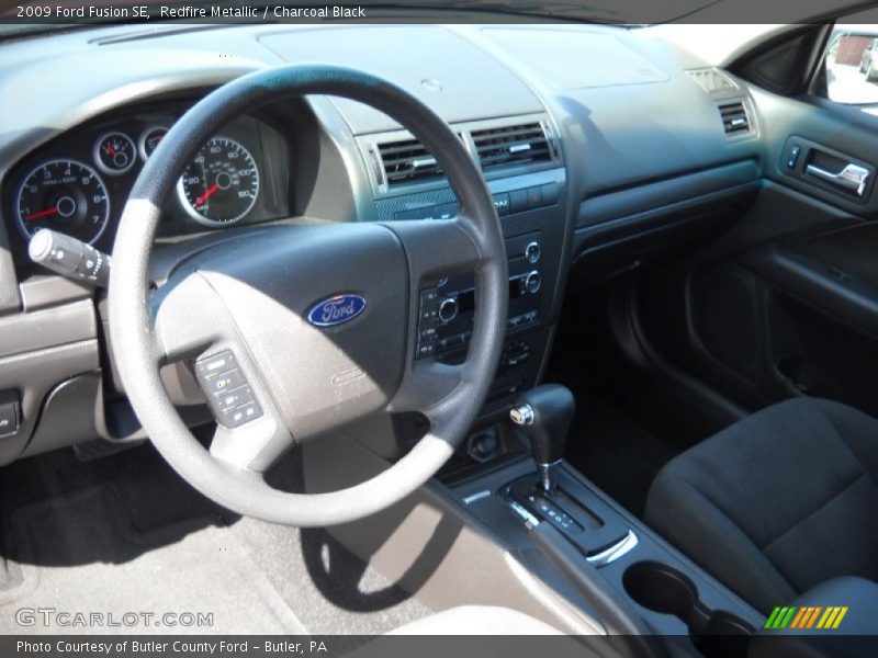 Redfire Metallic / Charcoal Black 2009 Ford Fusion SE