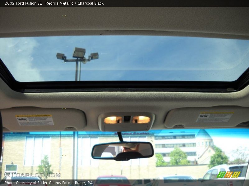 Redfire Metallic / Charcoal Black 2009 Ford Fusion SE