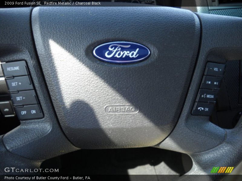 Redfire Metallic / Charcoal Black 2009 Ford Fusion SE