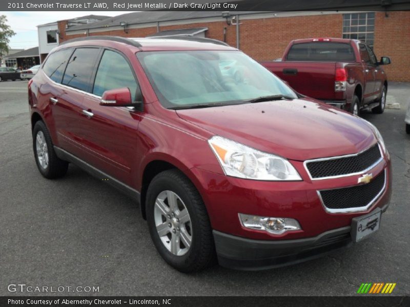 Red Jewel Metallic / Dark Gray/Light Gray 2011 Chevrolet Traverse LT AWD