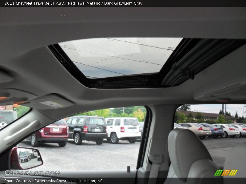 Red Jewel Metallic / Dark Gray/Light Gray 2011 Chevrolet Traverse LT AWD