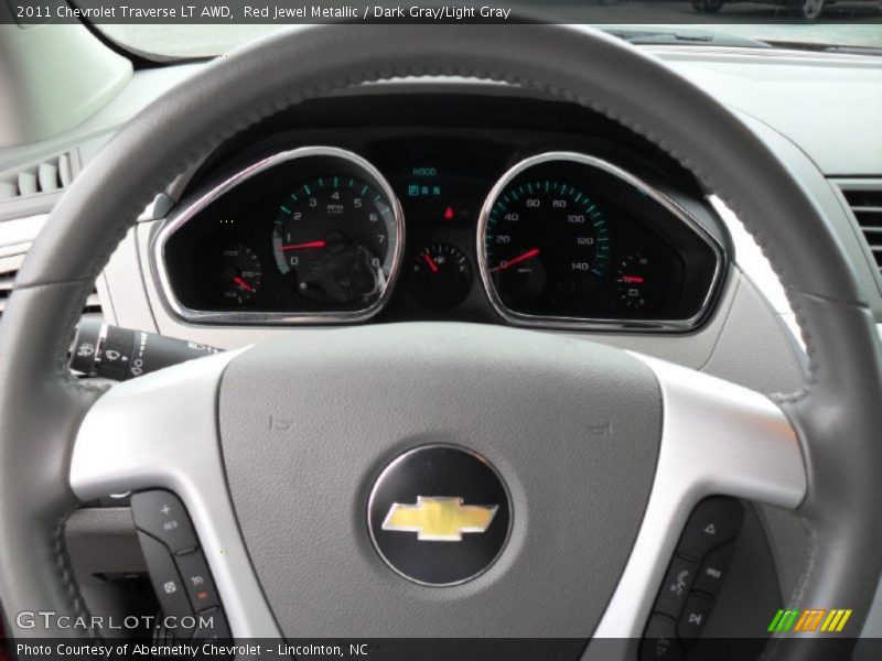 Red Jewel Metallic / Dark Gray/Light Gray 2011 Chevrolet Traverse LT AWD