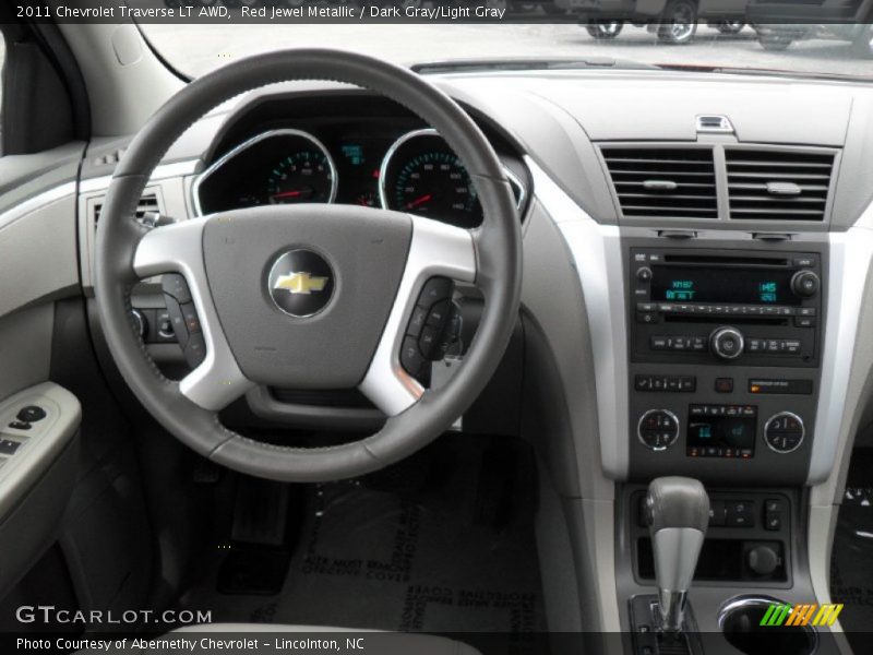 Red Jewel Metallic / Dark Gray/Light Gray 2011 Chevrolet Traverse LT AWD