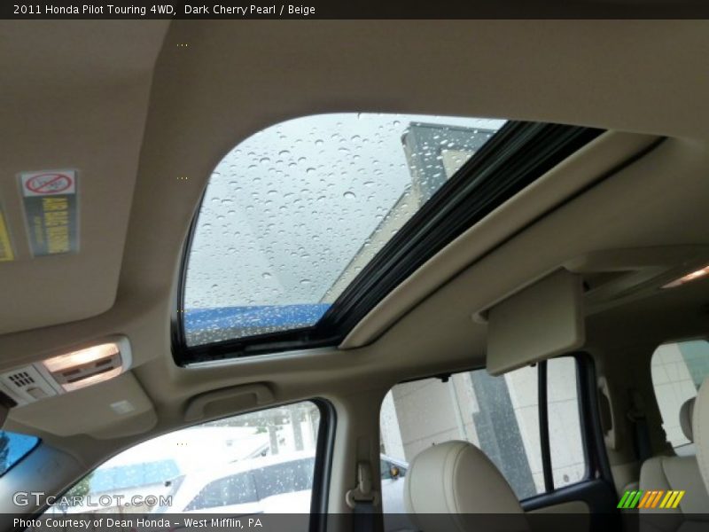 Dark Cherry Pearl / Beige 2011 Honda Pilot Touring 4WD