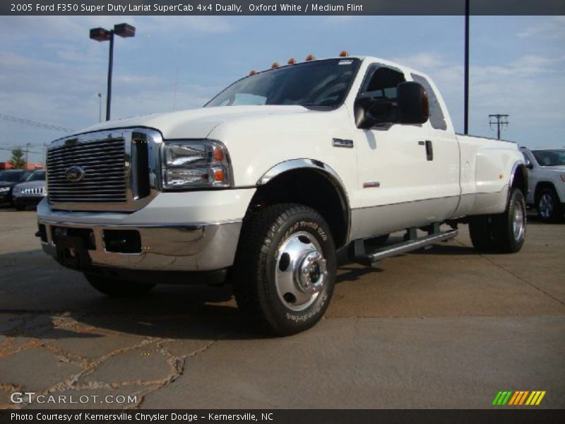 Front 3/4 View of 2005 F350 Super Duty Lariat SuperCab 4x4 Dually