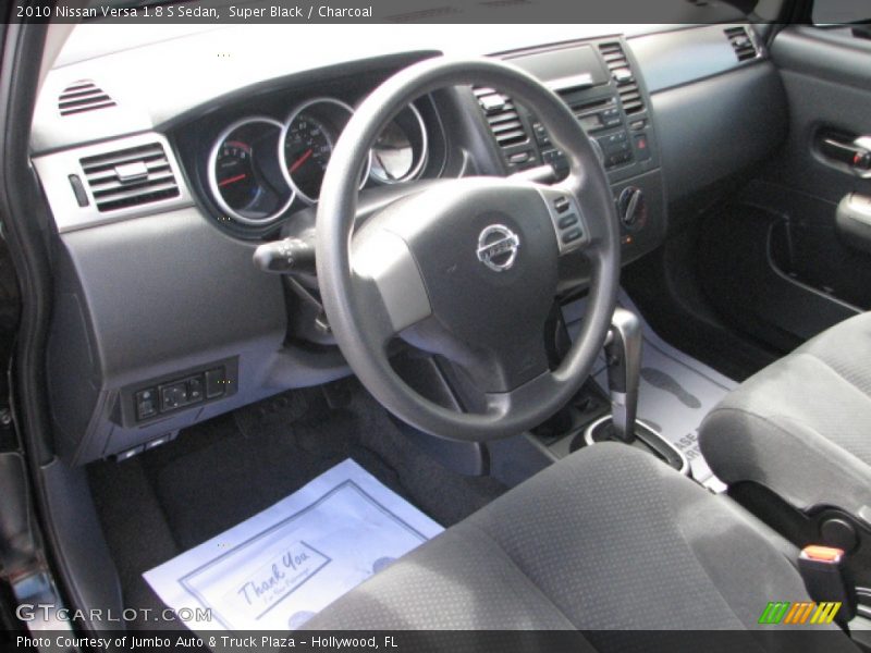 Super Black / Charcoal 2010 Nissan Versa 1.8 S Sedan