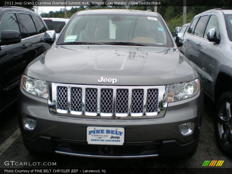 Mineral Gray Metallic / New Saddle/Black 2011 Jeep Grand Cherokee Overland Summit 4x4