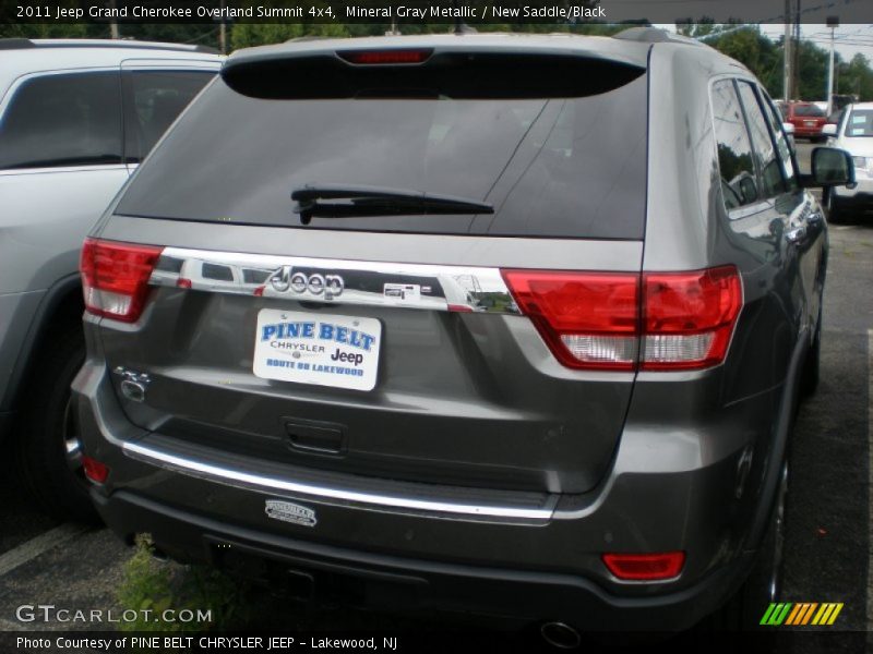 Mineral Gray Metallic / New Saddle/Black 2011 Jeep Grand Cherokee Overland Summit 4x4