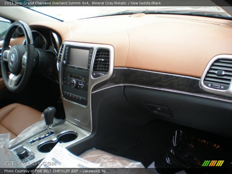 Mineral Gray Metallic / New Saddle/Black 2011 Jeep Grand Cherokee Overland Summit 4x4