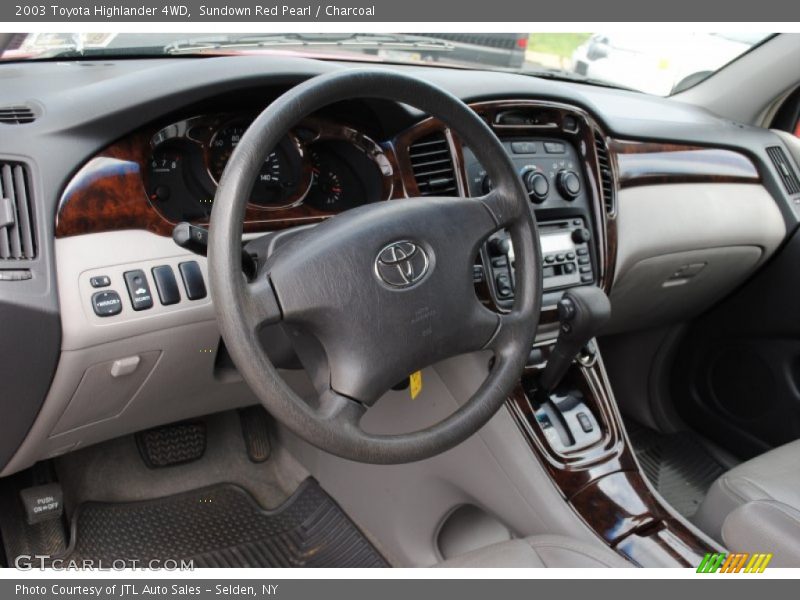Sundown Red Pearl / Charcoal 2003 Toyota Highlander 4WD
