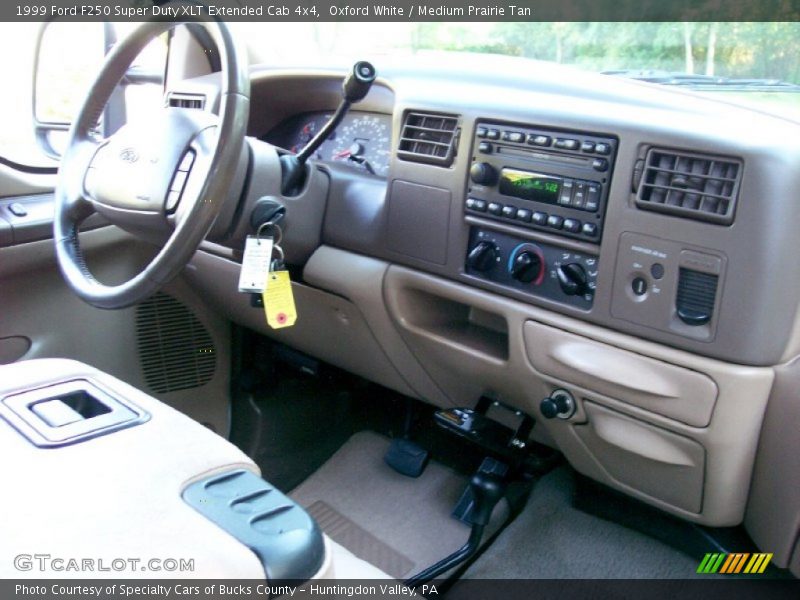 Oxford White / Medium Prairie Tan 1999 Ford F250 Super Duty XLT Extended Cab 4x4