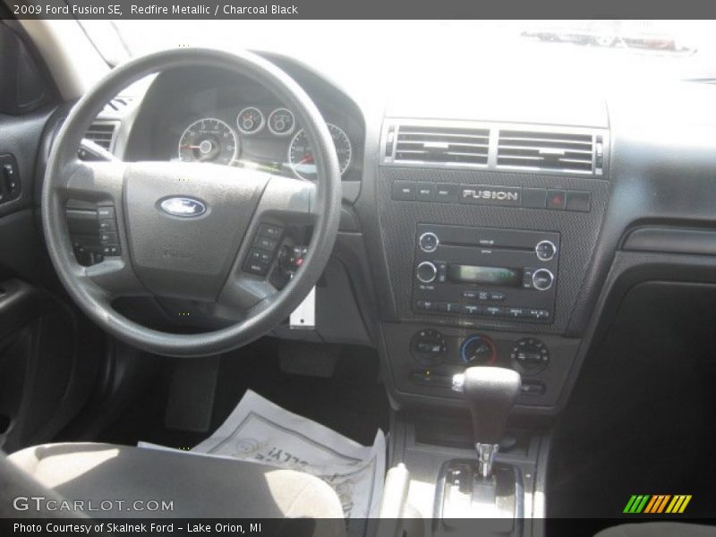 Redfire Metallic / Charcoal Black 2009 Ford Fusion SE