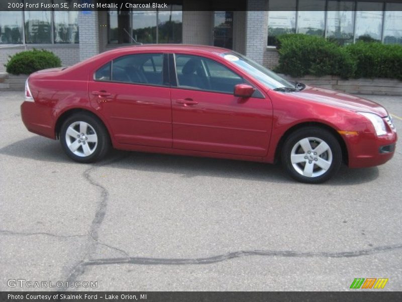 Redfire Metallic / Charcoal Black 2009 Ford Fusion SE