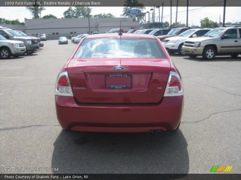 Redfire Metallic / Charcoal Black 2009 Ford Fusion SE