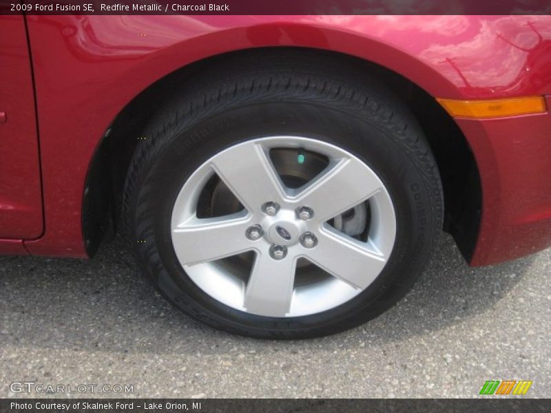 Redfire Metallic / Charcoal Black 2009 Ford Fusion SE