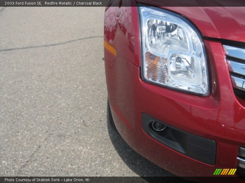 Redfire Metallic / Charcoal Black 2009 Ford Fusion SE