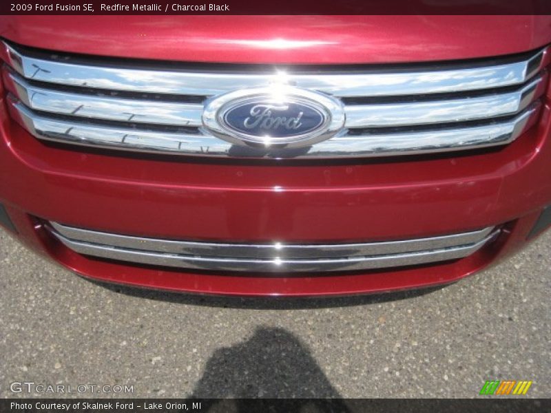 Redfire Metallic / Charcoal Black 2009 Ford Fusion SE