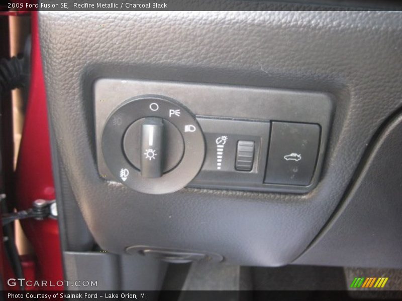 Redfire Metallic / Charcoal Black 2009 Ford Fusion SE